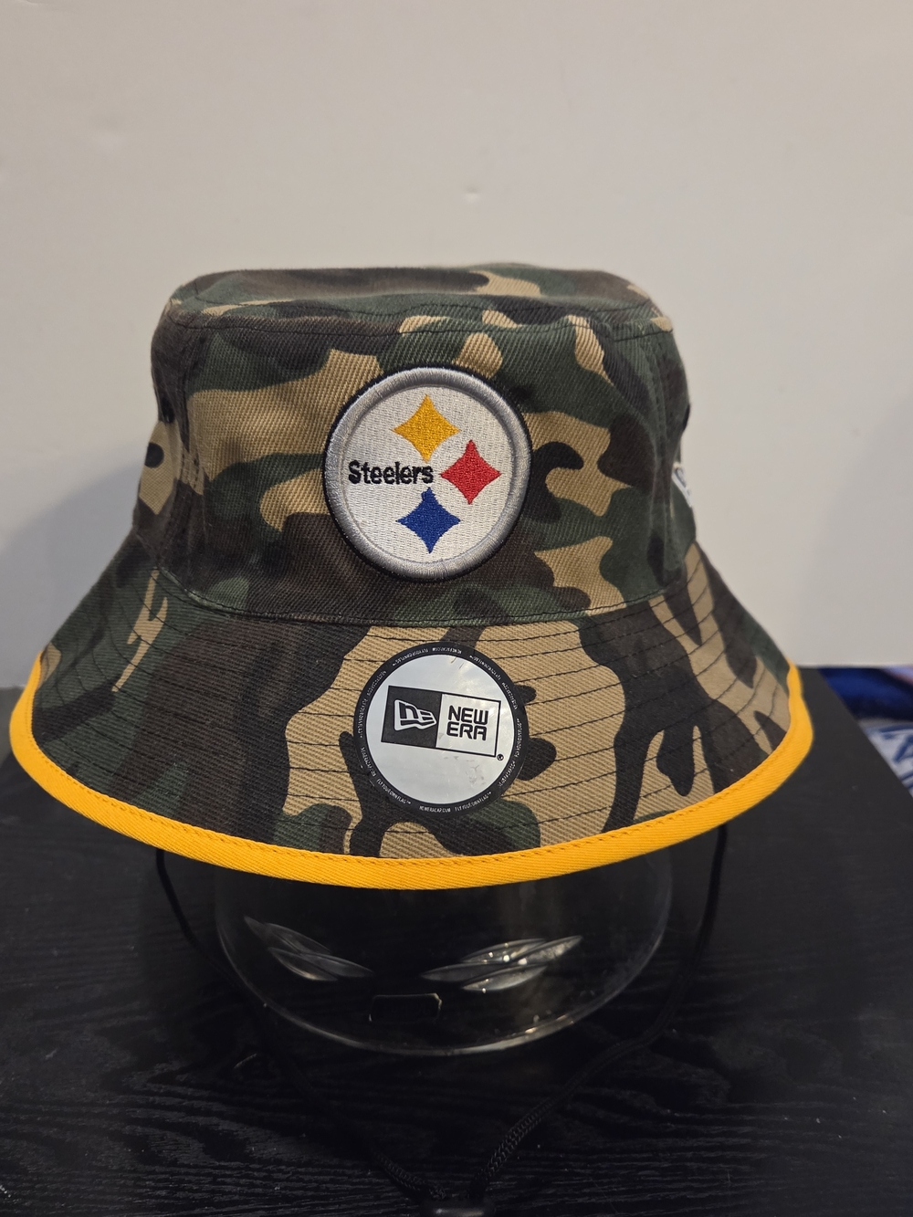 New Era Camo Bucket Hat with Yellow Trim